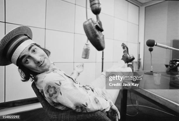 Drummer Keith Moon , of British rock group The Who, in a radio studio at Broadcasting House, London, 12th July 1973. Moon is recording skits to play...
