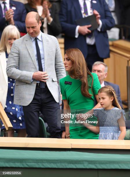 Prince William, Prince of Wales, Catherine, Princess of Wales and Princess Charlotte of Wales are seen in the Royal Box ahead of the Men's Singles...