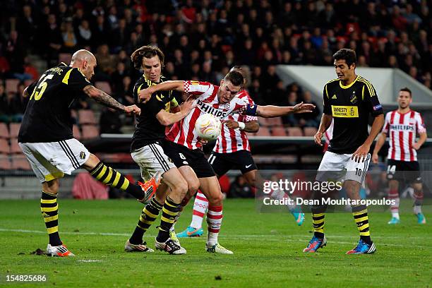 Kevin Strootman of PSV and Daniel Majstorovic , Nils-Eric Johansson and Celso Borges of AIK battle for the ball during the UEFA Europa League Group F...