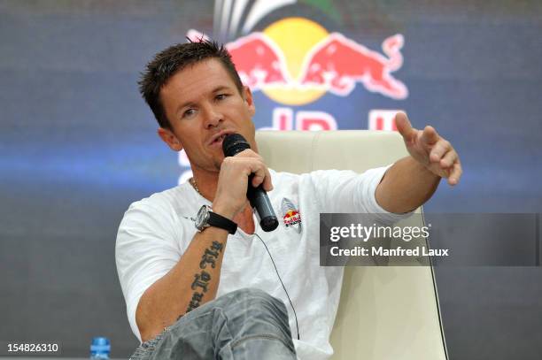 Austrian skydiver Felix Baumgartner speaks during a press conference at the Hangar-7 on October 27, 2012 in Salzburg, Austria.