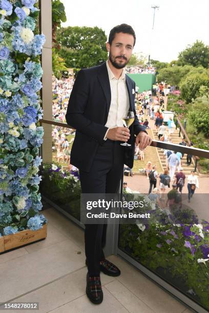 Jonah Hauer-King with Champagne Lanson at The Championships at Wimbledon on July 16, 2023 in London, England.