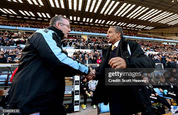 Norwich manager Chris Hughton and Aston Villa manger Paul Lambert shake hands prior to kick off during the Barclays Premier League match between...