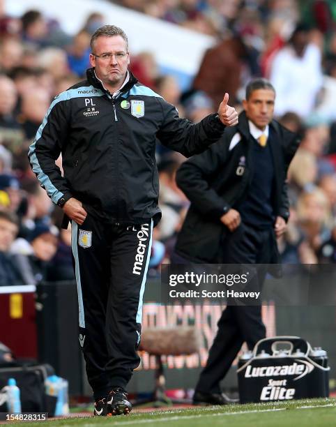 Aston Villa manager Paul Lambert gives the thumbs up after their first goal during the Barclays Premier League match between Aston Villa and Norwich...