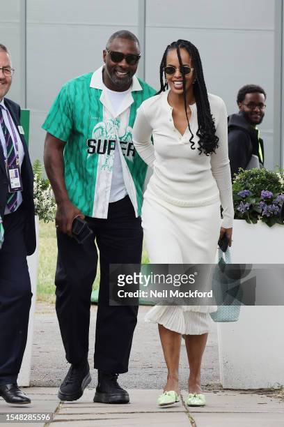Idris Elba and Sabrina Dhowre Elba attend day fourteen of the Wimbledon Tennis Championships at All England Lawn Tennis and Croquet Club on July 16,...
