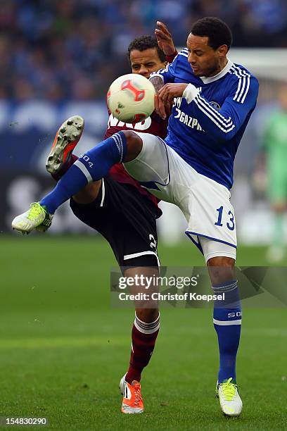 Timothy Chandler of Nuernberg challenges Jermaine Jones of Schalke during the Bundesliga match between FC Schalke 04 and 1. FC Nuernberg at...