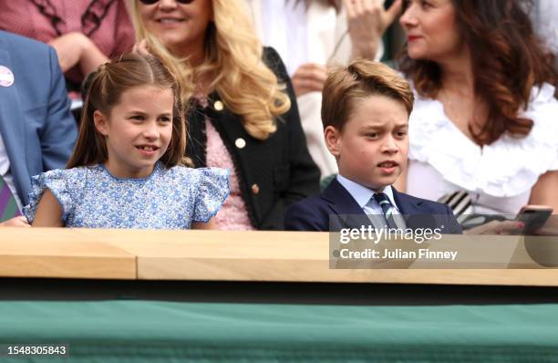Princess Charlotte of Wales and Prince George of Wales are seen in the Royal Box ahead of the Men's Singles Final between Novak Djokovic of Serbia...