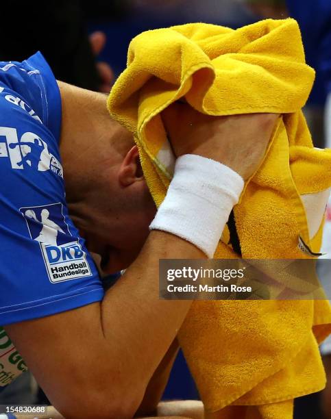 Pascal Hens of Hamburg looks dejected after losing the DKB Handball Bundesliga match between HSV Hamburg and THW Kiel at the O2 World on October 27,...