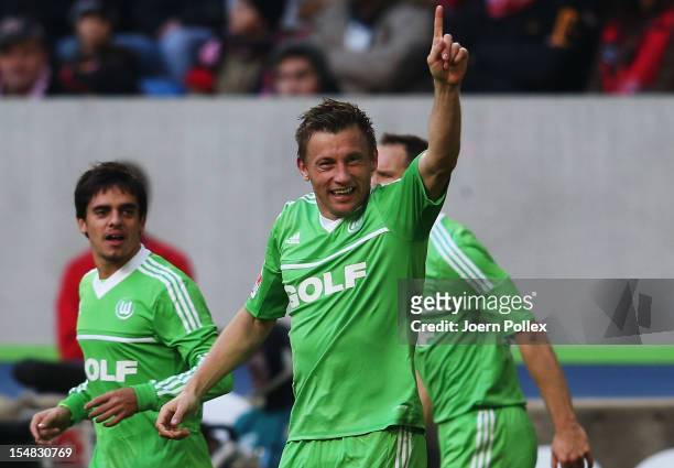 Ivica Olic of Wolfsburg celebrates with his team mates after scoring his team's second goal during the Bundesliga match between Fortuna Duesseldorf...