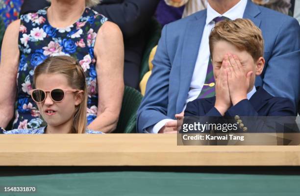 Princess Charlotte of Wales and Prince George of Wales watch Carlos Alcaraz vs Novak Djokovic in the Wimbledon 2023 men's final on Centre Court...
