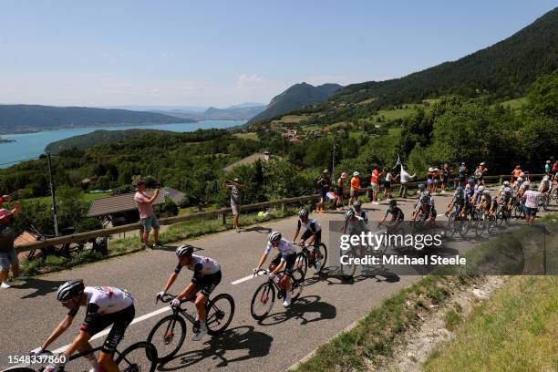 Marc Soler of Spain, Tadej Pogacar of Slovenia and UAE Team Emirates - White Best Young Rider Jersey and a general view of the peloton climbing to...