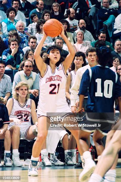 Israeli basketball player Orly Grossman, of the University of Connecticut, looks to pass during a game, Storrs, Connecticut, 1991.