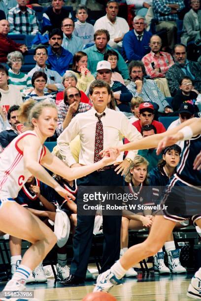 Italian-born American women's basketball coach Geno Auriemma, of the University of Connecticut, paces the sidelines during a game against the Russian...