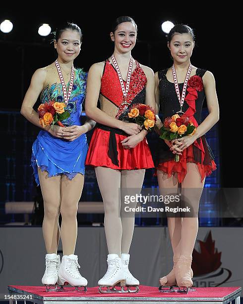 The winners of the ladies competition are from left to right, Silver medalist Akiko Suzuki from Japan, Gold metalist Kaetlyn Osmond from Canada and...
