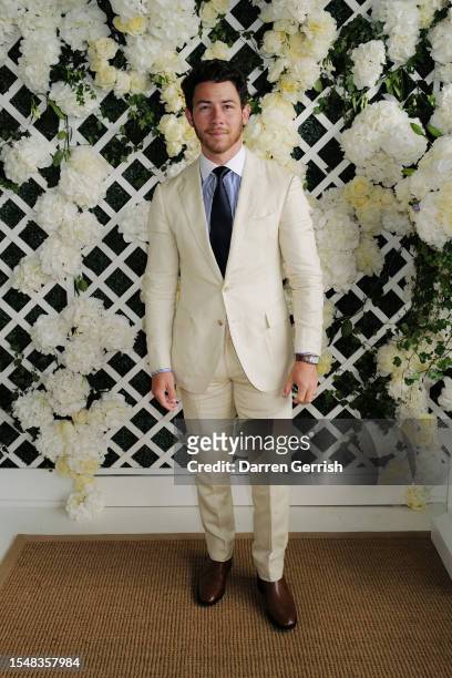Nick Jonas wearing Ralph Lauren, attends the Ralph Lauren Suite during The Championships, Wimbledon at All England Lawn Tennis and Croquet Club on...