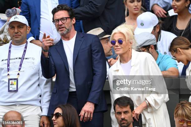 Hugh Jackman and Deborra-Lee Furness watch Carlos Alcaraz vs Novak Djokovic in the Wimbledon 2023 men's final on Centre Court during day fourteen of...