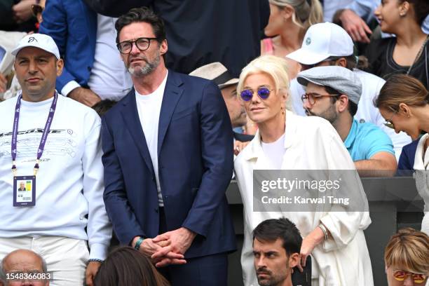 Hugh Jackman and Deborra-Lee Furness watch Carlos Alcaraz vs Novak Djokovic in the Wimbledon 2023 men's final on Centre Court during day fourteen of...