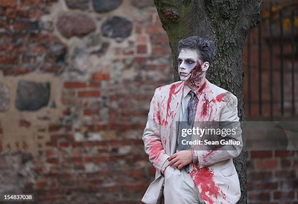 Zombie enthiusiasts gather before setting out on a "Zombie Walk" in the city center on October 27, 2012 in Berlin, Germany. Approximately 150...