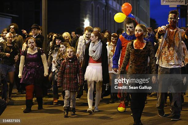 Zombie enthusiasts set out on a "Zombie Walk" in the city center on October 27, 2012 in Berlin, Germany. Approximately 150 zombies, who had organized...