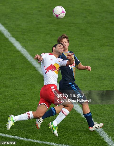 Rafa Marquez of the New York Red Bulls and Antoine Hoppenot of the Philadelphia Union chase the ball at PPL Park on October 27, 2012 in Chester,...