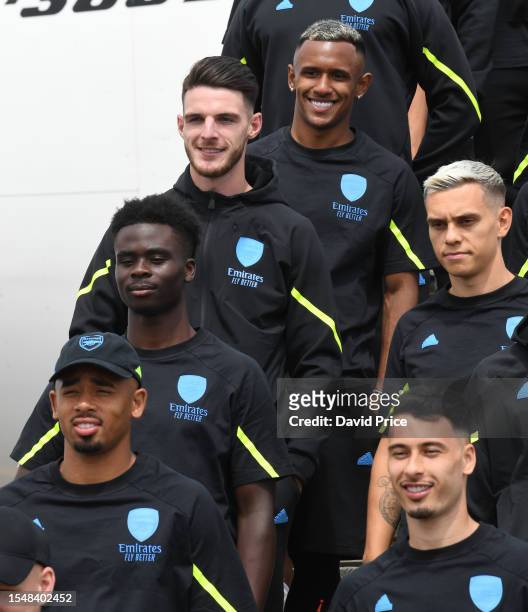 Gabriel Jesus, Bukayo Saka, Declan Rice, Marquinhos, Leandro Trossard and Gabriel Martinelli of Arsenal prepare to travel to the US at Stansted...