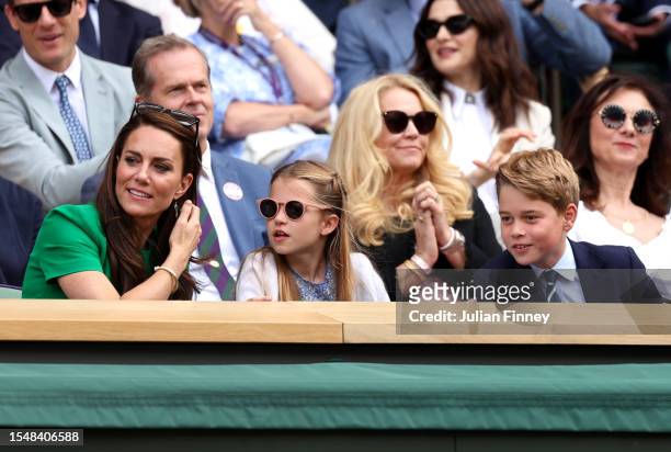 Catherine, Princess of Wales, Princess Charlotte of Wales and Prince George of Wales are seen in the Royal Box during the Men's Singles Final between...