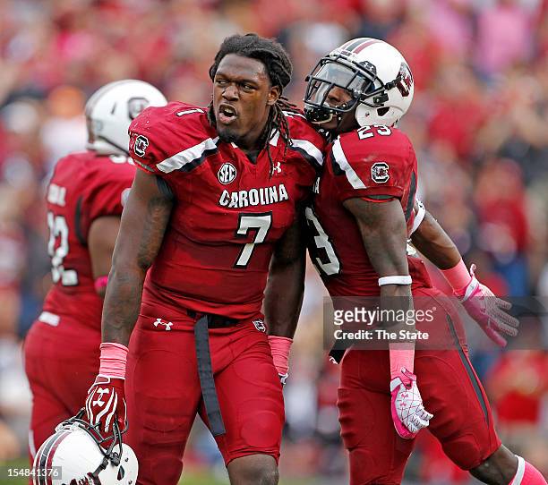 South Carolina defensive end Jadeveon Clowney celebrates after causing a fumble late in the fourth quarter against Tennessee on Saturday, October 27...