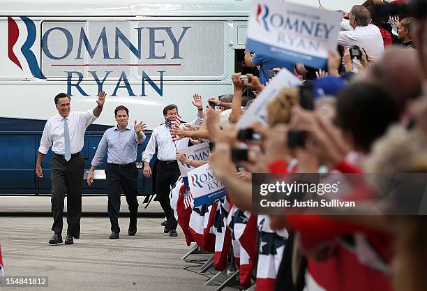 Republican presidential candidate, former Massachusetts Gov. Mitt Romney U.S. Sen. Marco Rubio and Rep. Connie Mack greet supporters during a...