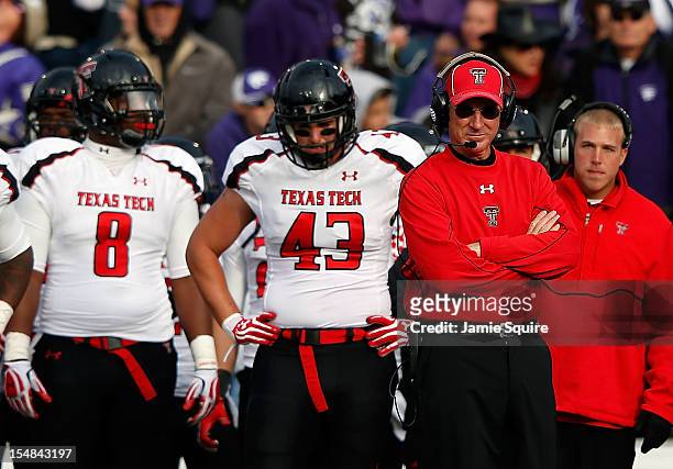 Head coach Tommy Tuberville of the Texas Tech Red Raiders watches from the sidelines during the game against the Kansas State Wildcats at Bill Snyder...