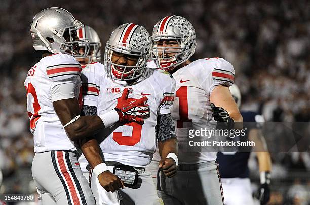 Quarterback Braxton Miller of the Ohio State Buckeyes celebrates after scoring a touchdown against the Penn State Nittany Lions in the third quarter...