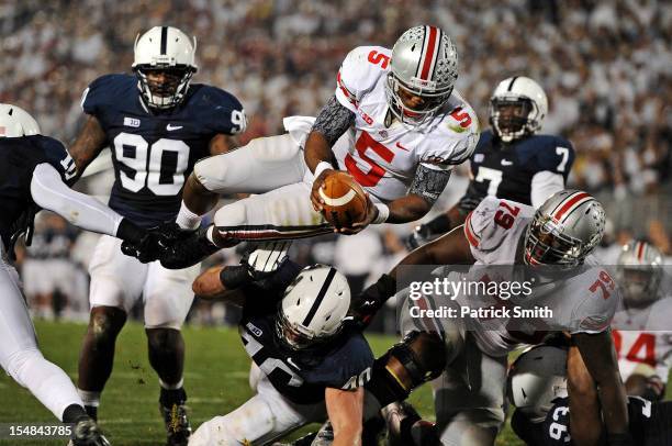 Quarterback Braxton Miller of the Ohio State Buckeyes dives into the end zone for touchdown against the Penn State Nittany Lions in the third quarter...