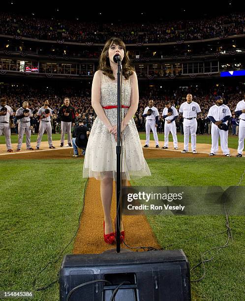 New Girl" star Zooey Deschanel performs the National Anthem before Game 3 of the 2012 World Series between the San Francisco Giants and Detroit...