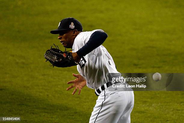 Austin Jackson of the Detroit Tigers misses a catch to center field by Brandon Crawford single to cause a fielding error in the second inning during...