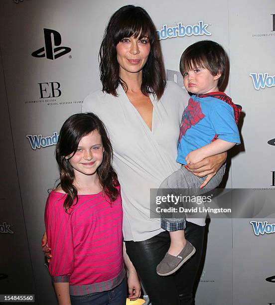 Actress Catherine Bell and children Gemma and Ronan attend EBMRF & Sony PlayStation's Epic Halloween Bash hosted by James Marsden and Courteney Cox...