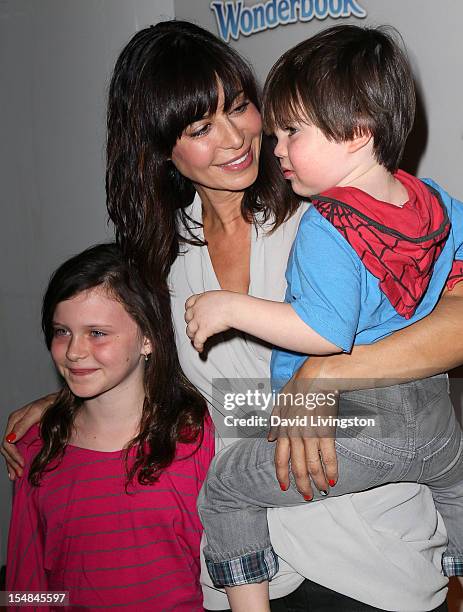 Actress Catherine Bell and children Gemma and Ronan attend EBMRF & Sony PlayStation's Epic Halloween Bash hosted by James Marsden and Courteney Cox...