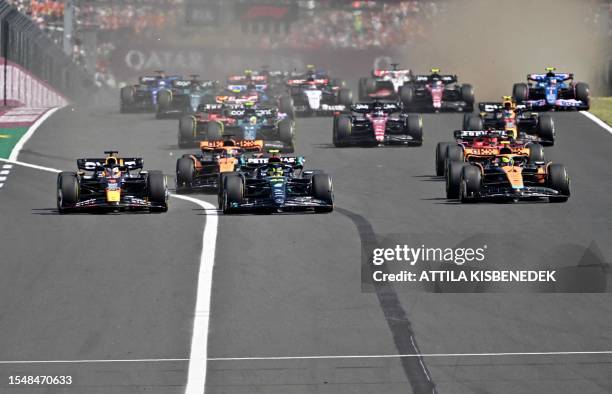 Red Bull Racing's Dutch driver Max Verstappen, Mercedes' British driver Lewis Hamilton and McLaren's British driver Lando Norris and other drivers...