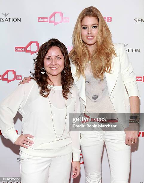 Executive Director of dance4life USA Michele Giordano and dodel Doutzen Kroes attend dance4life Cocktail Party at Milk Studios on October 27, 2012 in...