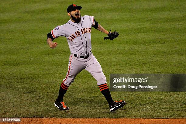 Sergio Romo of the San Francisco Giants celebrates after striking out Omar Infante of the Detroit Tigers to win Game Three of the Major League...