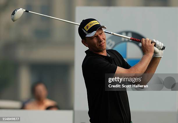 Marcel Seim of Germany tees off during the final round of the BMW Masters at the Lake Malaren Golf Club on October 28, 2012 in Shanghai, China.