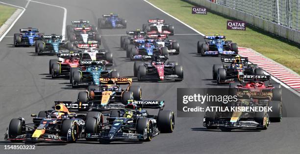 Red Bull Racing's Dutch driver Max Verstappen, Mercedes' British driver Lewis Hamilton and McLaren's British driver Lando Norris and others race...