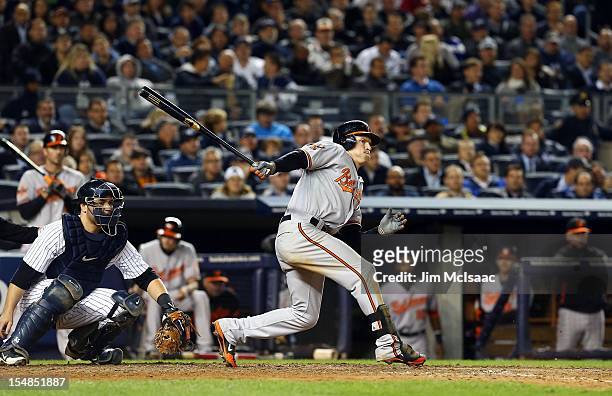 Nate McLouth of the Baltimore Orioles in action against the New York Yankees during Game Four of the American League Division Series at Yankee...