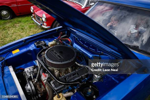 Chevrolet V8 360bhp engine is seen under the bonnet of a 1983 Ford Capri 5.7S during the annual classic car and motorcycle show on July 16, 2023 in...