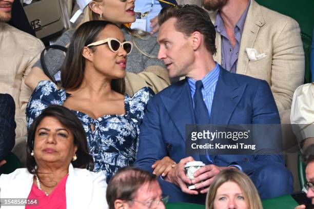 Zawe Ashton and Tom Hiddleston watch Carlos Alcaraz vs Novak Djokovic in the Wimbledon 2023 men's final on Centre Court during day fourteen of the...