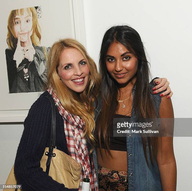 Robyn Holt and Priya Satiani during the opening reception for Diane Marshall-Green's Lolitas at America Martin Gallery on October 27, 2012 in Los...