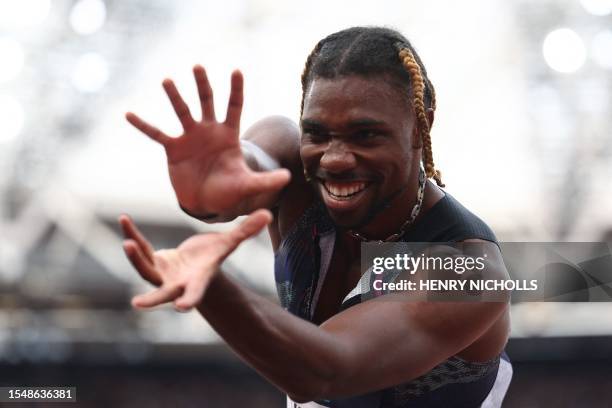 S Noah Lyles celebrates winning the men's 200m event during the IAAF Diamond League athletics meeting at the London Stadium in the Stratford district...