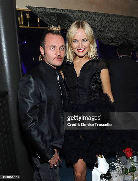 Roberto Zincone and Malin Akerman attend the grand opening of Simon Hammerstein's The ACT Las Vegas at The Palazzo on October 27, 2012 in Las Vegas,...