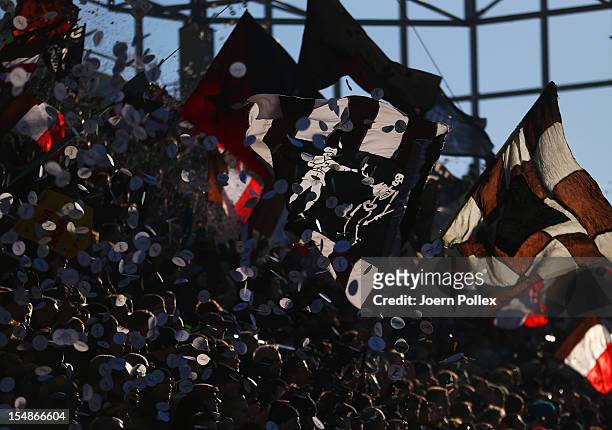 Fans of St. Pauli celebrate prior to the Second Bundesliga match between FC St. Pauli and Dynamo Dresden at the Millerntor stadium on October 28,...