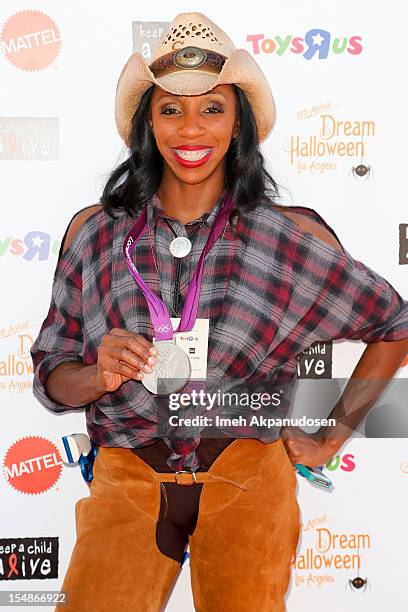 Olympic athlete Lashinda Demus attends the 2012 'Dream Halloween' presented by Keep A Child Alive at Barker Hangar on October 27, 2012 in Santa...