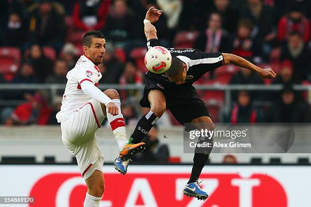 Vedad Ibisevic of Stuttgart is challenged by Bamba Anderson of Frankfurt during the Bundesliga match between VfB Stuttgart and Eintracht Frankfurt at...