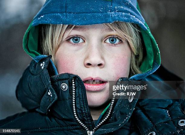boy in winter coat & snow - parka stock pictures, royalty-free photos & images