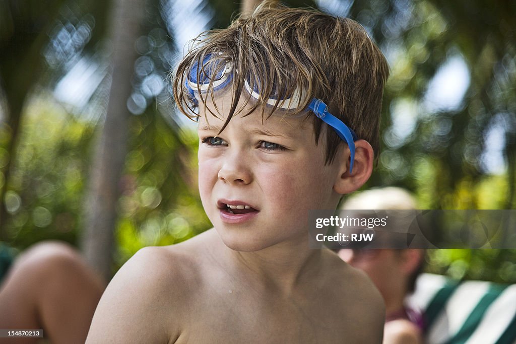 Boy with goggles on Head